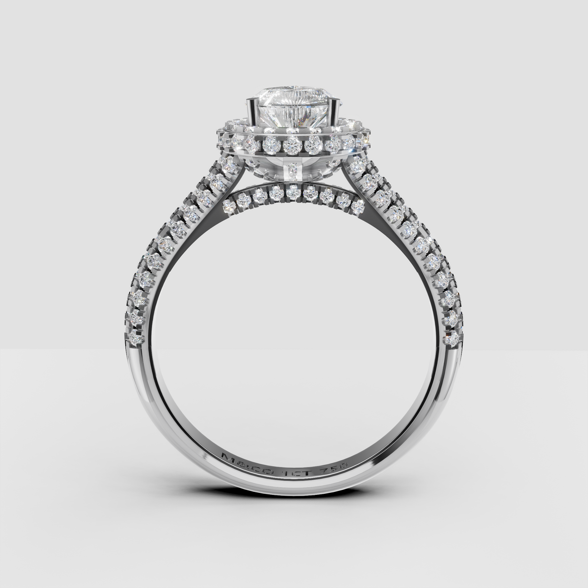 The Lumina Pear Halo Ring