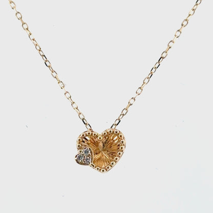 Kalung Emas Hati Menari
