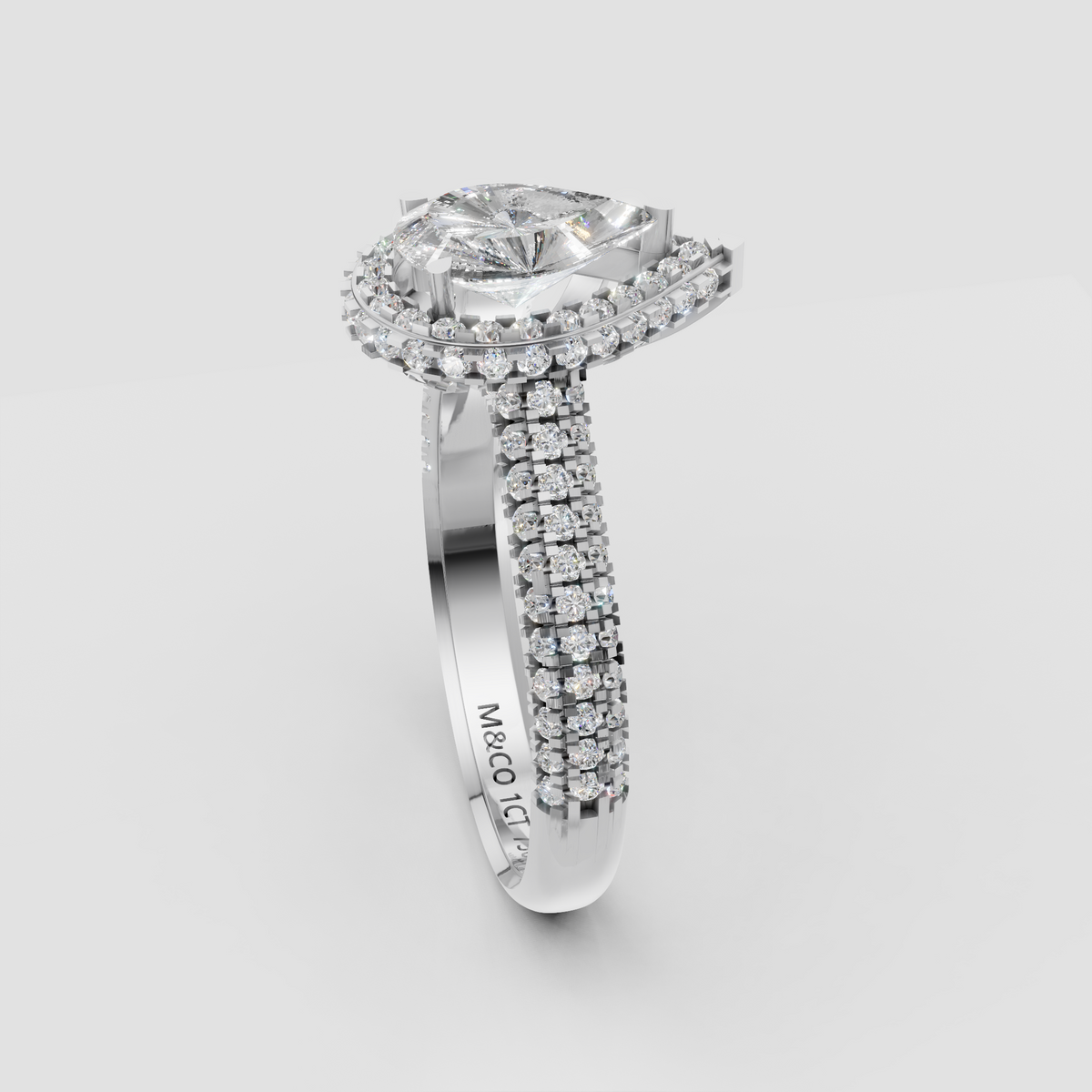 The Lumina Pear Halo Ring