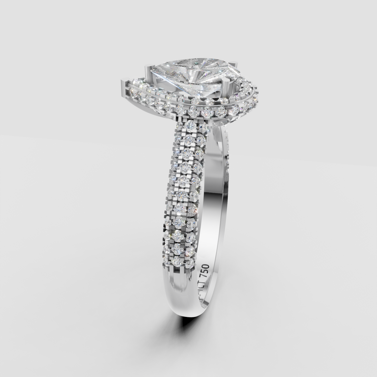 The Lumina Pear Halo Ring